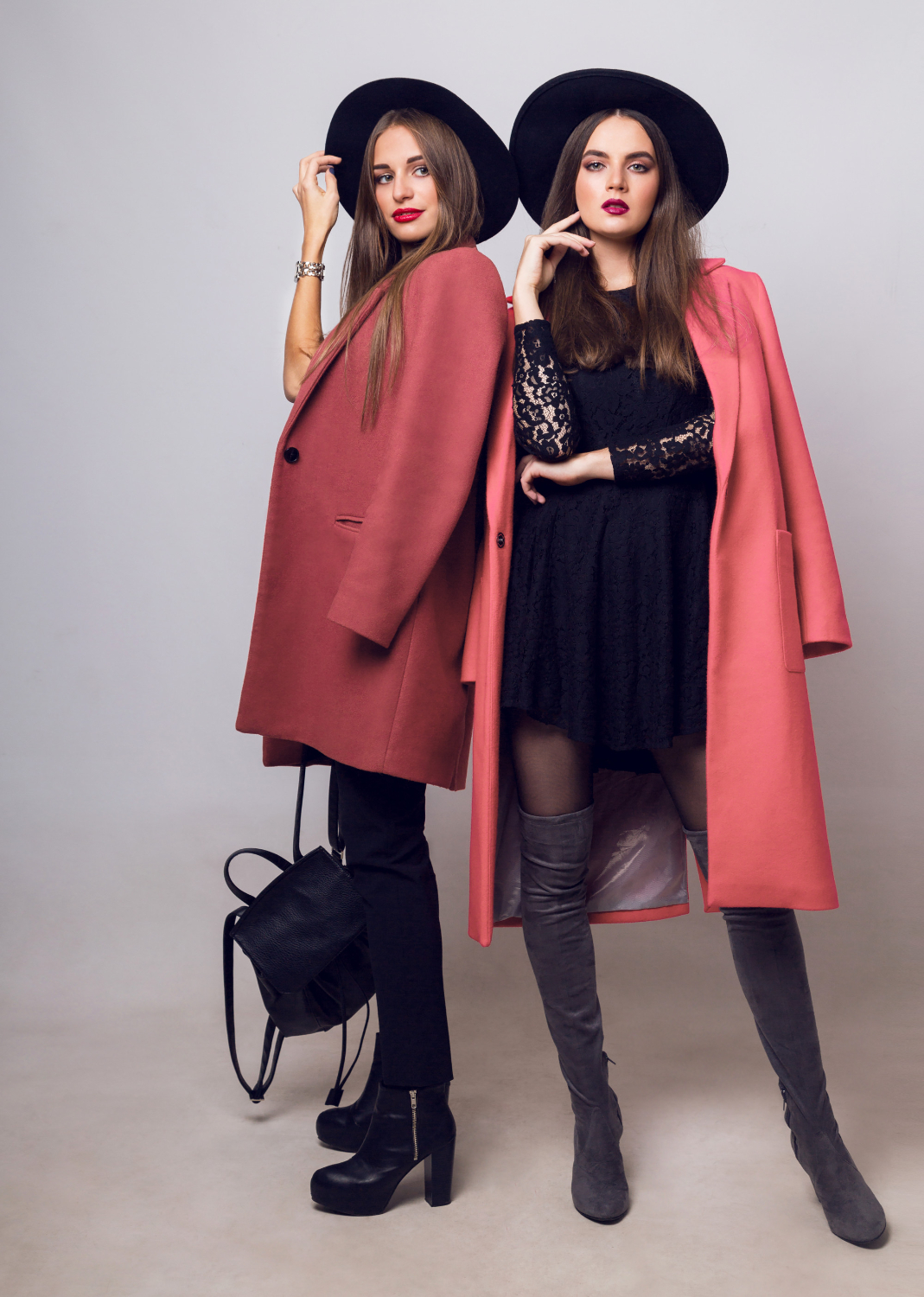 two-fashionable-young-women-casual-trendy-spring-coat-boots-with-heels-black-hat-stylish-handbag